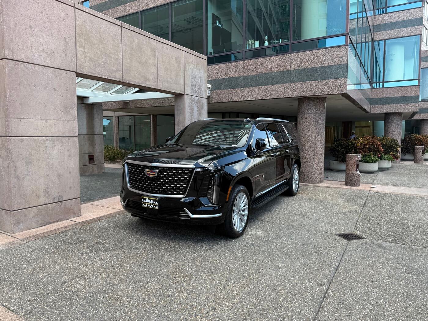 Cadillac Escalade outside a Tampa office tower